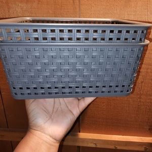 2 gray baskets
